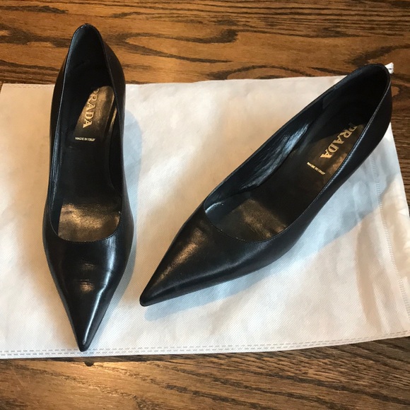 black leather kitten heel pumps